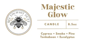Majestic glow candle with a logo of an insect on the left side