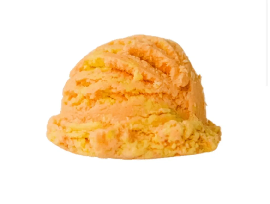 Scoop of orange ice cream on a white background
